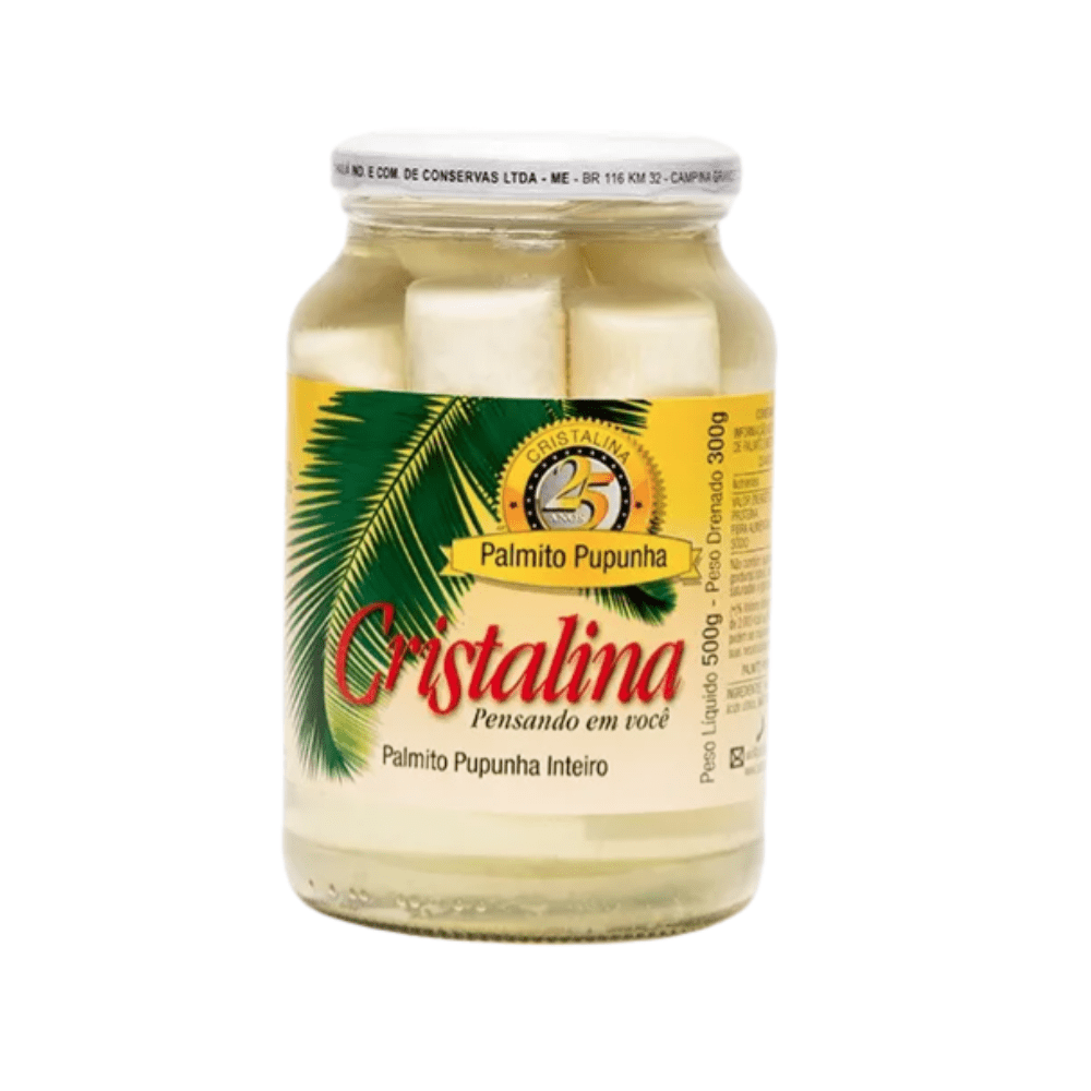 Pote de vidro com Palmito Pupunha Inteiro C ristalina. O vidro contém hastes brancas de palmito em conserva, e o rótulo destaca a marca em vermelho. Peso líquido 500g, peso drenado 300g.