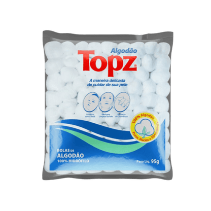 Embalagem plástica transparente contendo bolas de algodão hidrófilo da marca Topz. O rótulo em vermelho, azul e branco exibe a marca "Topz" e o título "BOLAS DE ALGODÃO 100% HIDRÓFILO". A embalagem contém 95g e destaca que o produto é 100% algodão, puro, macio e absorvente, sendo ideal para cuidados com o bebê, limpeza da pele e uso em cosméticos.