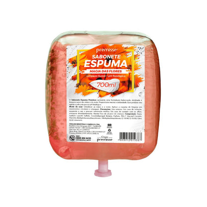 Refil/Sachê de Sabonete Espuma Premisse 'Magia das Flores' em embalagem plástica salmão/laranja de 700ml. O refil possui um tubo dosador curto e rosa claro na parte inferior. O rótulo destaca a 'Limpeza Suave' e o 'pH fisiológico'.