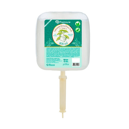 Refil de 800 ml de Sabonete Erva Doce Soft da marca Premisse, destinado a ser usado em dispensers. O rótulo branco e verde claro destaca que o produto é da linha 4 Classic Plus, tem pH fisiológico e contém extrato de Aveia. O design inclui ilustrações de ramos de erva doce.